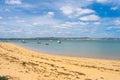 Praia De Faro, Algarve, Portugal. Aerial view on coast of ocean and beach. Boats on water, drone view Royalty Free Stock Photo