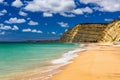 Praia de Porto de Mos in Lagos, Portugal. Praia do Porto de Mos, long beach in Lagos, Algarve region, Portugal. Beautiful golden Royalty Free Stock Photo