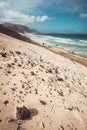 Praia Grande. Spectacular sand dunes, ocean waves and black volcanic stones. Barren landscape of Calhau, Sao Vicente Royalty Free Stock Photo