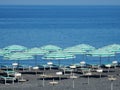 Praia a Mare - Green umbrellas on the beach of Fiuzzi