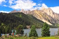 Prairie full of flowers ,High Mountain and Lake Cuopu Royalty Free Stock Photo