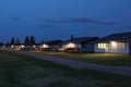 prairie homes with flat roofs under moonlight