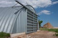 Prairie Quonset with fallen down house Royalty Free Stock Photo