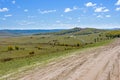 The prairie and unsurfaced road Royalty Free Stock Photo