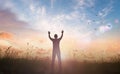 Silhouette of healthy man raised hands