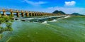 Wide view of flooded krishna river flows through prakasam barrage in Vijayawada, Andhrapradesh, India