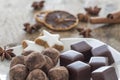 Pralines of Chocolate and marzipan and cinnamon stars Royalty Free Stock Photo