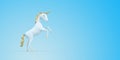 Prancing white unicorn on blue background