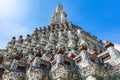 Prang at Wat Arun. From the base looking up. Blue sky and clouds in background. Royalty Free Stock Photo