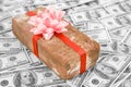 Prank gift and dollars Royalty Free Stock Photo