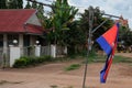 Prapor cambodia swaying in the wind, an overcast evening in south east asia