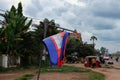 Prapor cambodia swaying in the wind, an overcast evening in south east asia