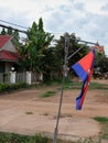 Prapor cambodia swaying in the wind, an overcast evening in south east asia