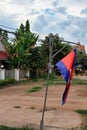 Prapor cambodia swaying in the wind, overcast evening in south east asia