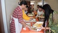 Prasad or bhog (holy food) distribution in progress