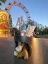 Prater, Vienna, Austria. 3 May 2020. A full trash bin in from of the Prater theme park