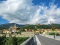 Panoramic view of the medieval fortified town with church of Saint-Juste-et-Sainte-Ruffine, Fort Lagarde and mountains, southern Royalty Free Stock Photo
