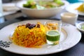 Prawn Biryani served with fried shrimp, green hot sauce and raisins Royalty Free Stock Photo