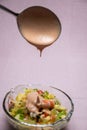 Prawn cocktail with lettuce, pink sauce, crab sticks, pineapple, apple. Glass bowl. A fresh, healthy, vegan and very healthy Royalty Free Stock Photo