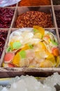 Prawn crackers and dried chillies for sale in a spice market in Beijing, China