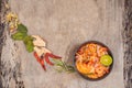 Prawn and lemon grass soup with mushrooms,Tom Yam Kung ,thai food in wooden background, top view Royalty Free Stock Photo