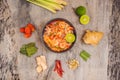 Prawn and lemon grass soup with mushrooms,Tom Yam Kung ,thai food in wooden background, top view Royalty Free Stock Photo