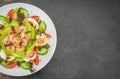 Prawn salad with cucumber and avocado, seeds, vegetables, lettuce Royalty Free Stock Photo