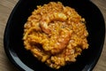 Prawn and squid risotto on a table