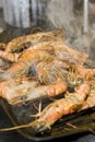 Prawns on a barbecue plate Royalty Free Stock Photo