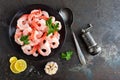 Prawns on plate. Shrimps, prawns. Seafood. Top view. Dark background