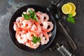 Prawns on plate. Shrimps, prawns. Seafood. Top view. Dark background Royalty Free Stock Photo