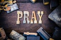 Pray Concept Wood and Rusted Metal Letters Royalty Free Stock Photo