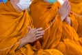 Pray of monks on ceremony of buddhist in Thailand. Many Buddha monk sit on the red carpet prepare to pray and doing Buddhist cerem