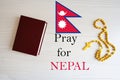 Pray for Nepal. Rosary and Holy Bible background Royalty Free Stock Photo