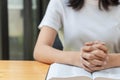 Pray and religion concept, Female christian hands folded and read bible to praying for spirituality Royalty Free Stock Photo