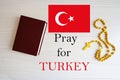Pray for Turkey. Rosary and Holy Bible background