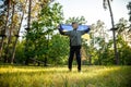 Pray for Ukraine. boy with Ukrainian flag running the summer park. Little kid waving national flag praying for peace. Happy child Royalty Free Stock Photo