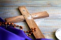 Prayer almsgiving fasting Ash Wednesday concept with wooden cross Royalty Free Stock Photo