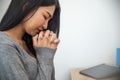 Prayer and bible concept. Asian female praying, hope for peace and free from coronavirus, Hand in hand together by woman, believes Royalty Free Stock Photo
