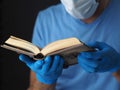 A prayer book in men`s hands. Royalty Free Stock Photo