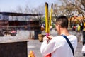 Prayer burning incense and wish good luck