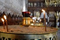 Prayer candles in Arkadi monastery. Royalty Free Stock Photo