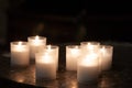 Lighting Prayer Candles in a Church Royalty Free Stock Photo