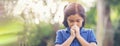 Prayer concept. Asian child praying, hope for peace and free from coronavirus, Hand in hand together by kid, believes and faith in