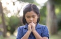 Prayer concept. Asian child praying, hope for peace and free from coronavirus, Hand in hand together by kid, believes and faith in Royalty Free Stock Photo