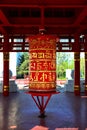 The prayer drum in a Buddhist temple with ancient prayer letters Royalty Free Stock Photo
