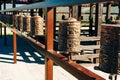 Prayer drum. Old prayer cylinders in Nepal. Tibetan Prayer wheels. Buddhist rolls in row