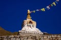 Prayer flags on big stupa with buddha eyes in Nepal in Namche Bazar village Royalty Free Stock Photo