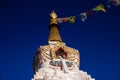 Prayer flags on big stupa with buddha eyes in Nepal in Namche Bazar village Royalty Free Stock Photo