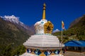 Prayer flags on big stupa with buddha eyes in Nepal in Namche Bazar village Royalty Free Stock Photo
